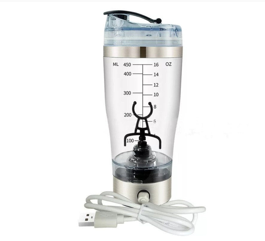 USB cable plugged into the base of a clear Electric Protein Shaker Bottle.